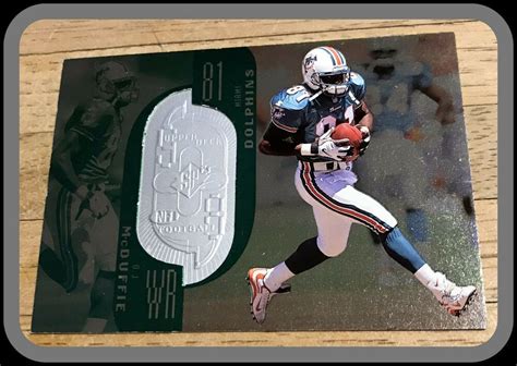 MIAMI DOLPHINS 1998 UD SPX FINITE O J MCDUFFIE 235 NUMBERED 08075