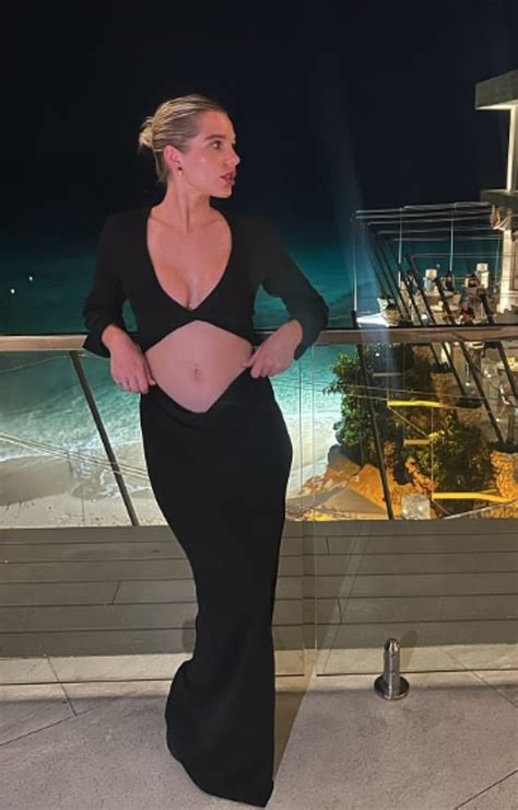 Helen Flanagan Showcases Her Very Toned Abs In A Black Cut Out Gown