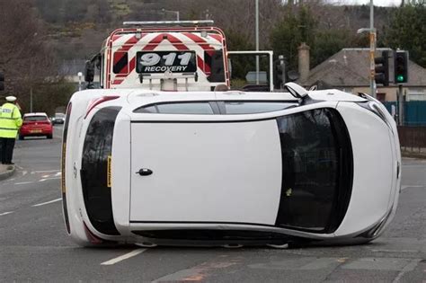 Car flips over after crash in Edinburgh sparking emergency response ...