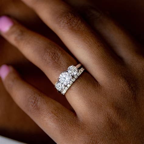 Round Three Stone Diamond Engagement Ring