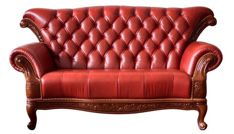 Premium Photo | A red leather couch with wood trim