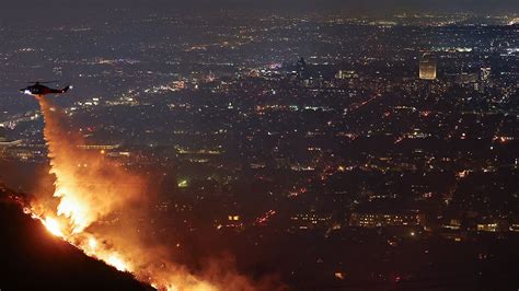 Arson Suspected As Wildfires Ravage Los Angeles Santa Monica Caught In