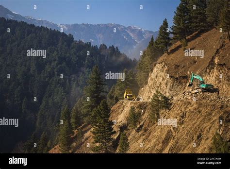 Mountain road construction in progress in the mountains Stock Photo - Alamy