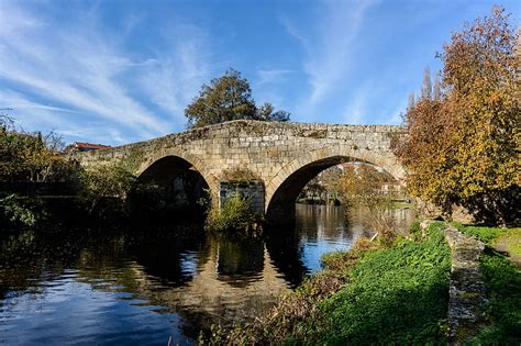 Royalty-Free photo: Gray concrete bridge over river | PickPik