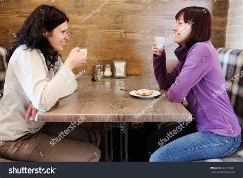 women friends talking cafe stock photo  shutterstock