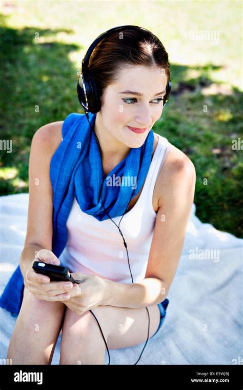 Woman Listening To Music Stock Photo Alamy