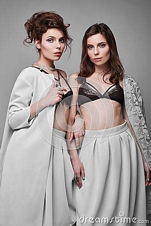 Portrait Of Two Beautiful Sensual Brunette Models Twins Stock Photo CartoonDealer 66620922