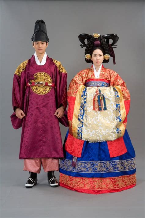 The Bride And Groom In The Traditional Korean Wedding Dresses