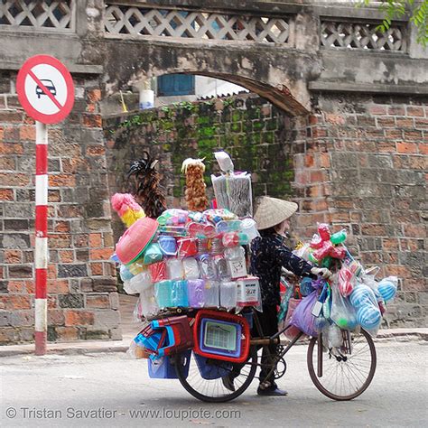 Street Vendor On Bicycle Vietnam