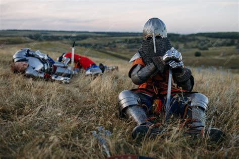 premium photo medieval knight  armor  helmet sitting