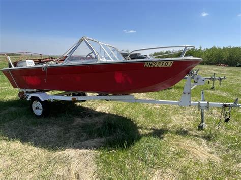 Dunkle Auction Services Sears 14 Ft Open Bow Boat W 50 Hp Untested