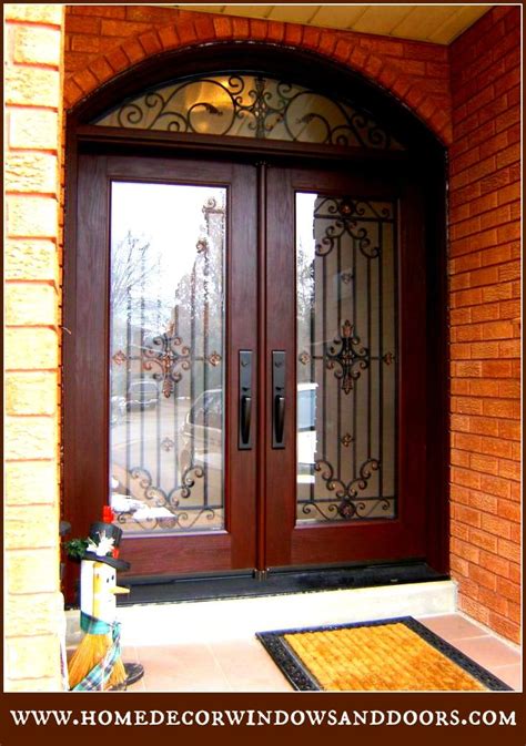 Custom Wrought Iron Double Door With Matching Transom Complete With Copper Accents Custom