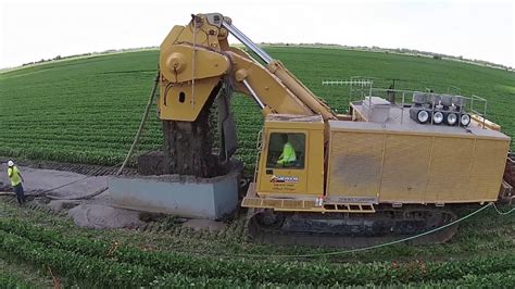 Dewind One Pass Trenching Mt Trencher Installing Soil Bentonite