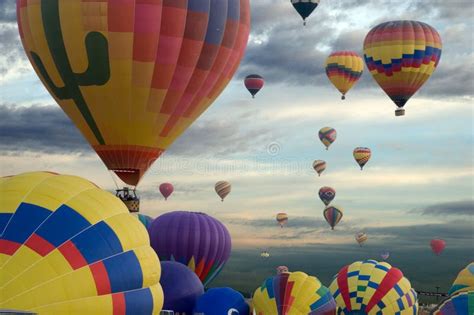 Colorful Array Of Hot Air Balloons Soaring Through The Sky At A Festive