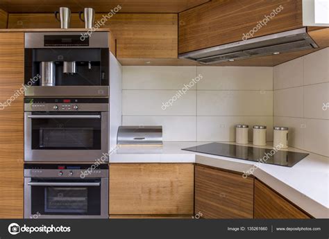 Modern kitchenette with wooden furniture Stock Photo by ©photographee ...