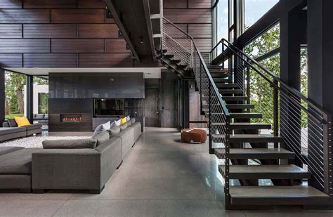 Industrial modern house boasts a serene lakeside setting in Minnesota