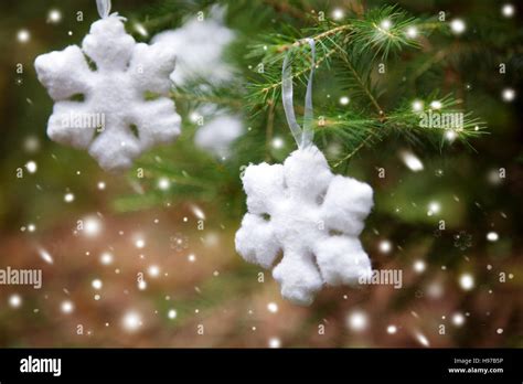 Snowflake On A Christmas Tree Season Greetings Stock Photo Alamy