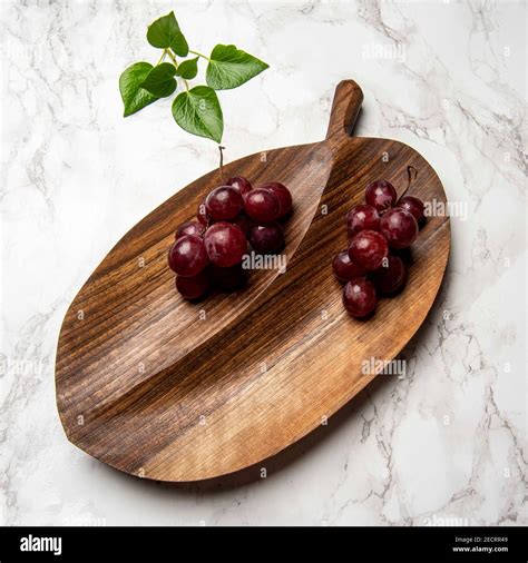 Hand Carved Wooden Snack Board Stock Photo Alamy