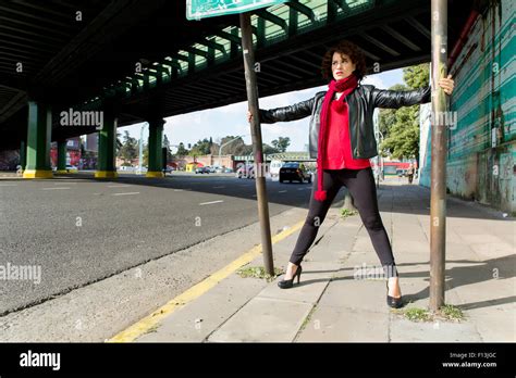 Gorgeous Brunette Woman On The Street With Graffiti Wall Stock Photo Alamy