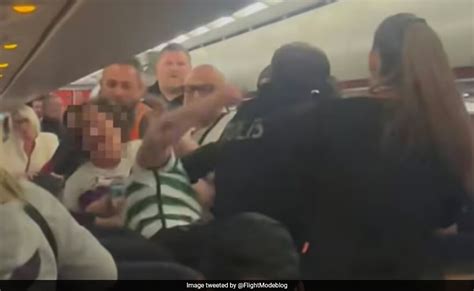 Watch Drunk Easyjet Passenger Loses Control Throws Punches At Cops