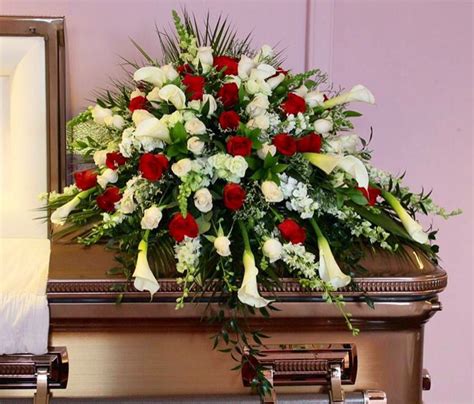 Calla Lilies And Roses Look Extraordinary For This Traditional Casket