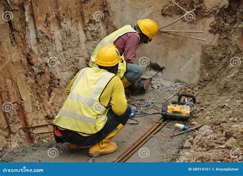 Workers Drilling Concrete Using Mobile Drilling Machine Editorial Photo