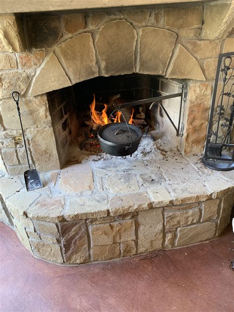 A lodge pot over the fire at the parents house. Good soup pot. : r/castiron