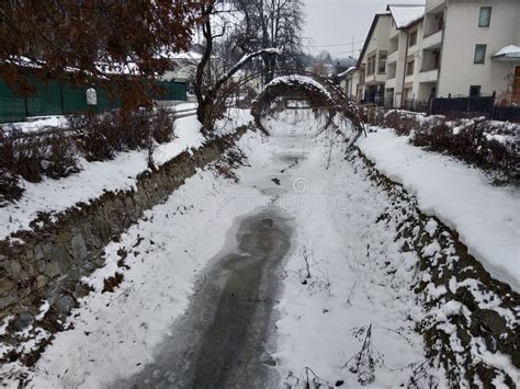 Frozen River With Snow And Ice In The Winter Season Romania