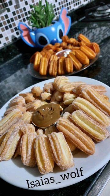 There Is A Plate Full Of Donuts On The Table