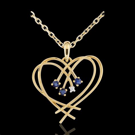 Pendentif Coeur étincelles diamant et saphirs or jaune 9 carats