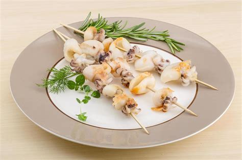 Grilled Cuttlefish On The Plate And Wooden Background 12686081 Stock