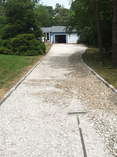 Crushed Seashell Driveway with Cobblestone Edge - RI Landscaper 855RILAWNS