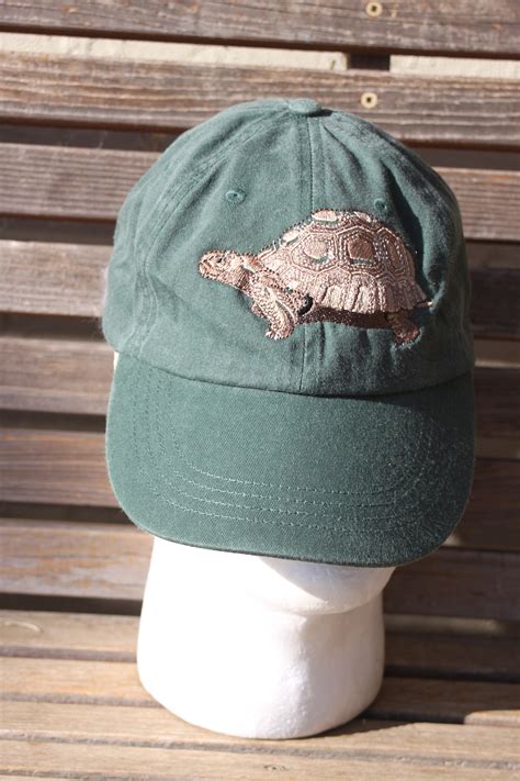 A Turtle Tortoise Is Embroidered On A Baseball Hat Cap Adjustable Hat