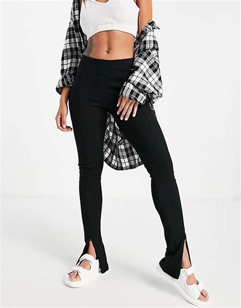 Topshop Ribbed Flared Legging With Zip Front Split Hem In Black Asos