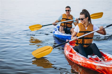 Couple together kayaking on the river