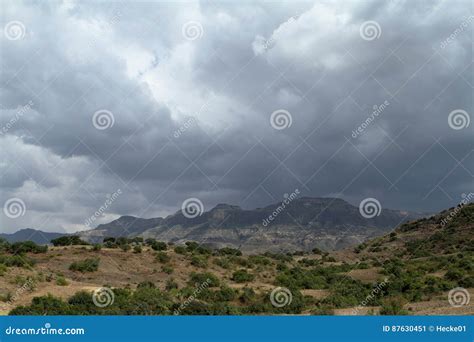 Rainy season in Africa stock image. Image of mountains - 87630451