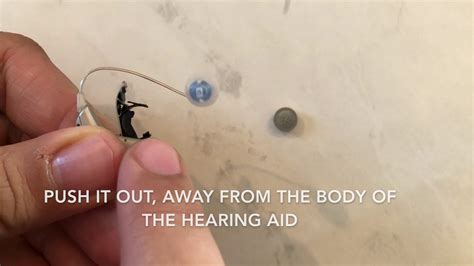 How To Change The Battery In Oticon Hearing Aids Youtube