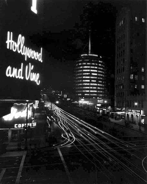 A Night Shot Of The Capitol Records Building And Neon Lights At