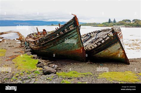 Old Decaying Fishing Boats Beached By Salen Bay And The A849 Road On