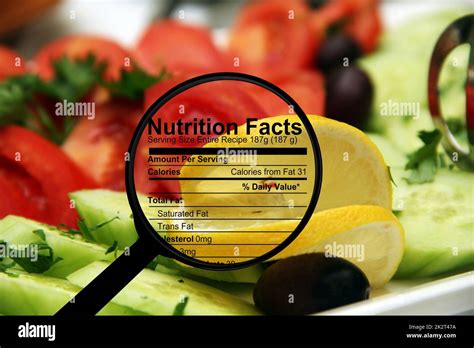 Nutrition facts on fresh salad Stock Photo - Alamy