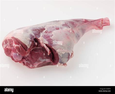 Raw leg of lamb Stock Photo - Alamy