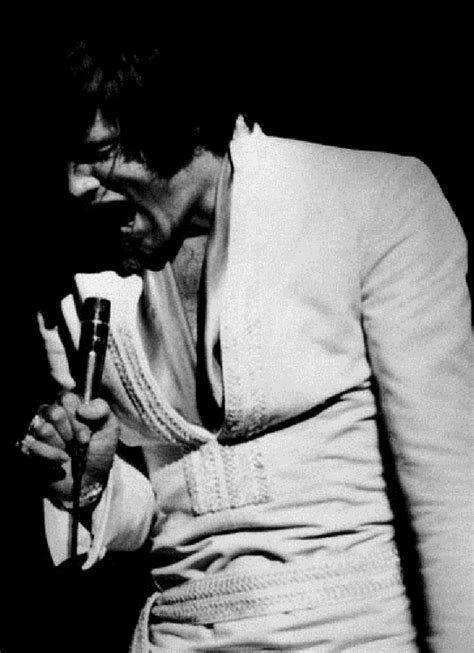 Elvis Performing At The Las Vegas International Wearing White