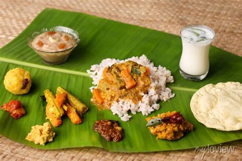 Onam Sadhya Indian Women Eating With Hand Boiled Rice Served