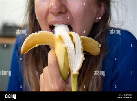 Woman Eats Food Woman Eats Banana Close Shot Of Girl Eating Bananas