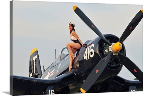 1940s Style Navy Pin Up Girl Sitting On A Vintage Corsair Fighter Plane Great Big Canvas