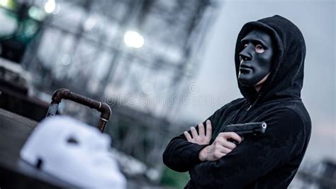 Mystery Man In Black Mask Holding White Masks Stock Image Image Of