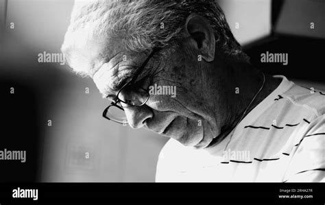 Mature Man In Emotional Turmoil Eyes Shut And In Despair Monochrome Depiction An Elder