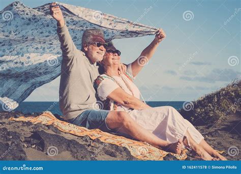 Happy Senior Caucasian Couple Enjoy The Outdoor Leisure Activity Together Active Old People In