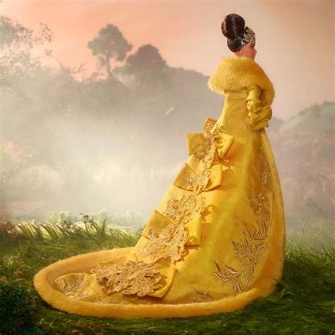 Guo Pei Barbie Doll Wearing Golden Yellow Gown