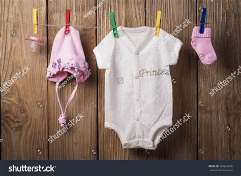 Baby Clothing Hanging On Clothesline On Stock Photo Edit Now